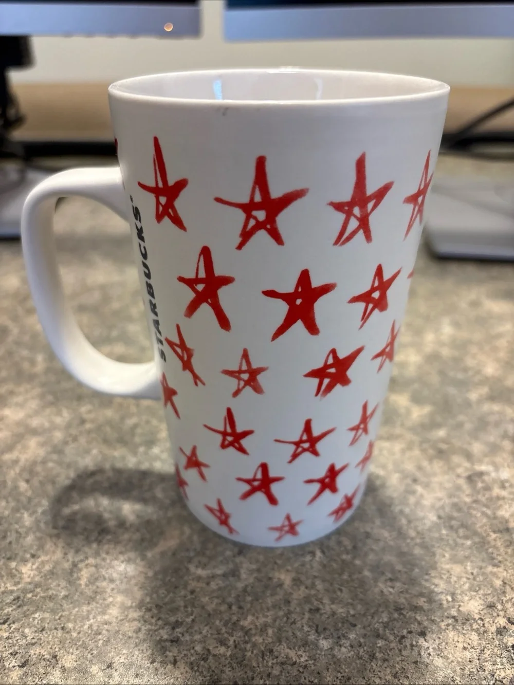 Starbucks White Mug with Black Siren Logo and Red Star Pattern